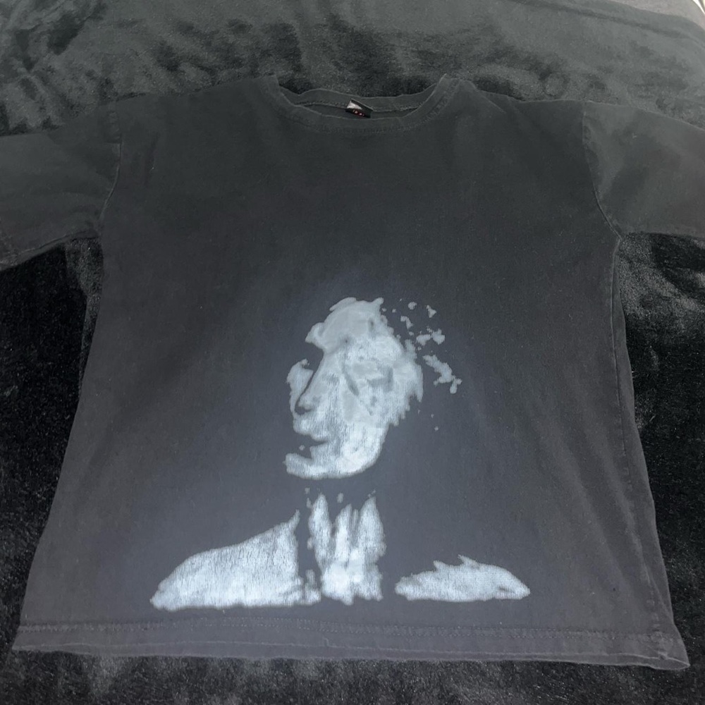 futuristic figure black shirt